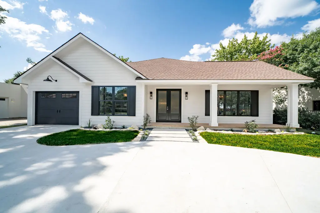 Complete home exterior renovation with modern farmhouse design in San Antonio TX